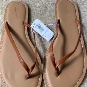 BRAND NEW old navy flip flops!
